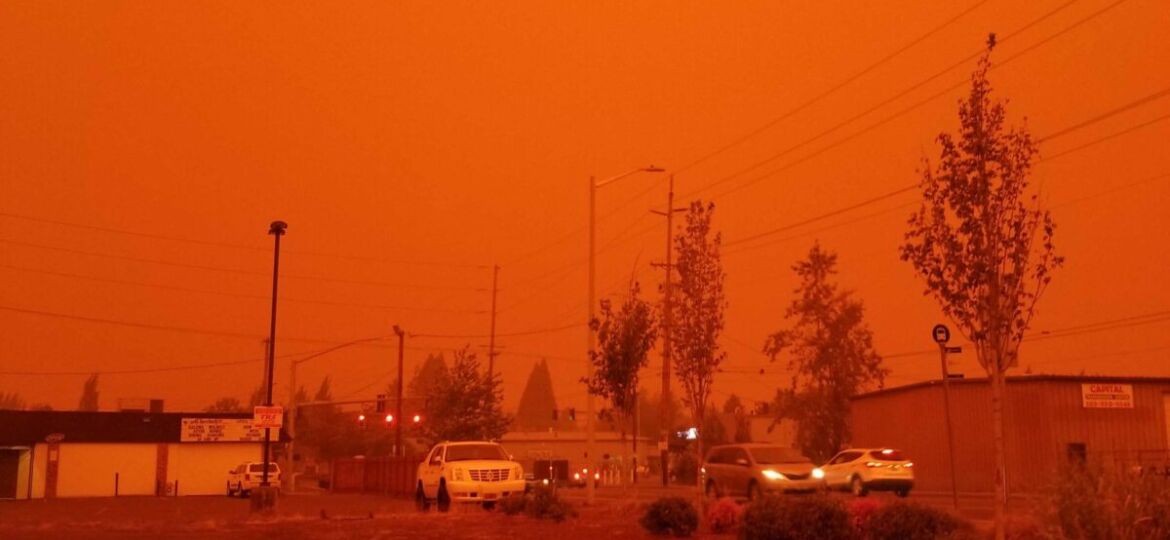 Thick smoke enveloping a town in Oregon during extreme wildfire in 2020