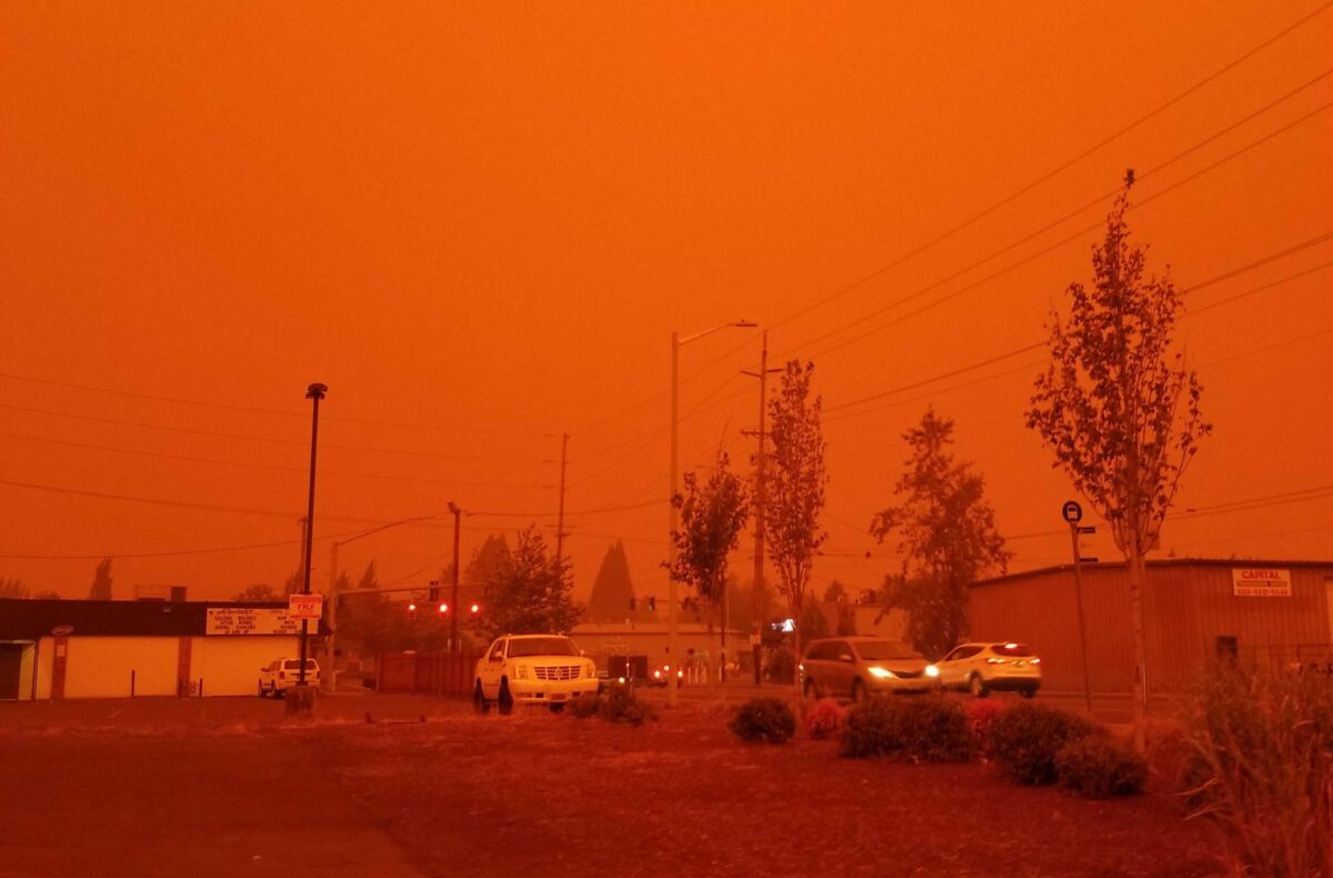 Thick smoke enveloping a town in Oregon during extreme wildfire in 2020